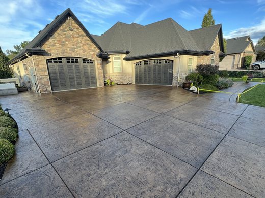 Brown stamped driveway colored with Solomon Colors integral pigment